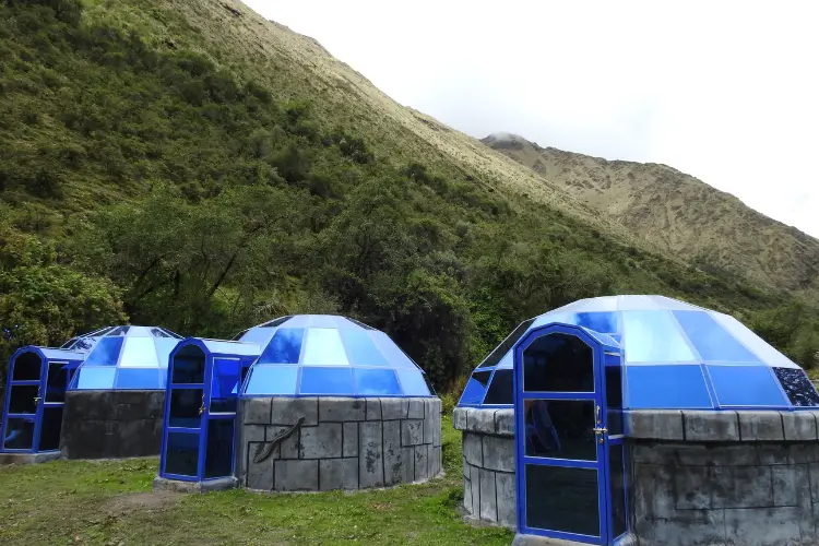 Our Lodge del Cielo in Collpapampa, surrounded by lush Andean landscapes.