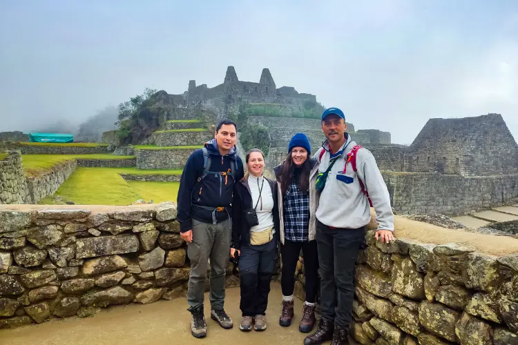 Trekkers reaching Machu Picchu the culmination of their journey.